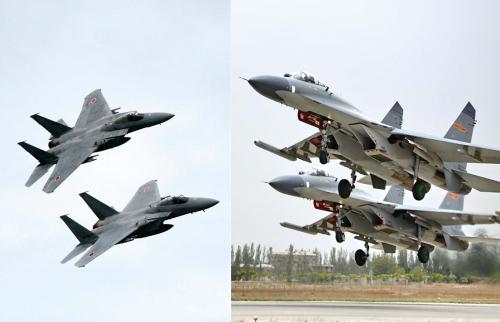 日本航空自衛隊的F-15(左)和中國空軍蘇-30戰機
